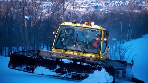 groomer going up the hill