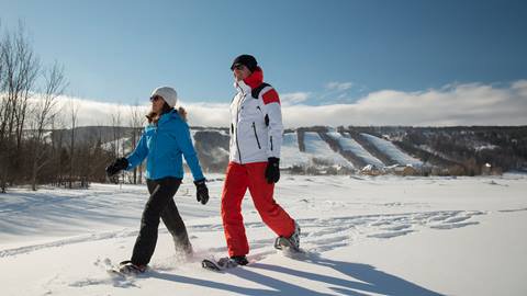 A couple snowshoeing at Blue Mountain Resort