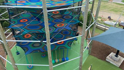 an image displaying the 3 tier cocoon crawl climbing net at blue mountain resort