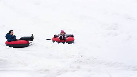 a boy and girl enjoying Hike N' Tube at Blue Mountain Resort