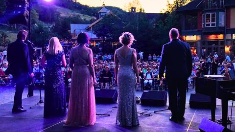 An opera troupe performing at the Subaru Stage at Blue Mountain Resort